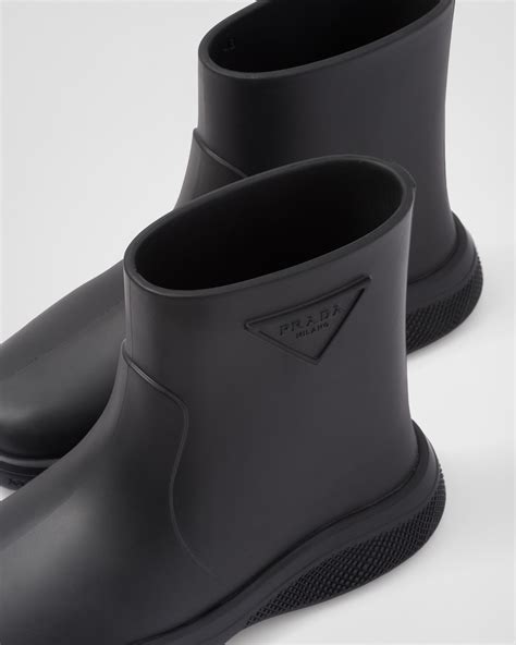 prada gummistiefel|Black Foam rubber booties .